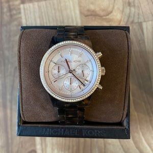 New in box Michael Kors Tortoise Rose Gold Watch (battery needs replacement)